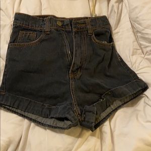Size 2 black high rise denim shorts. Super cute!